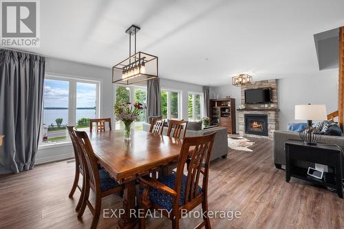 183 Lake Drive N, Georgina (Keswick North), ON - Indoor Photo Showing Dining Room With Fireplace