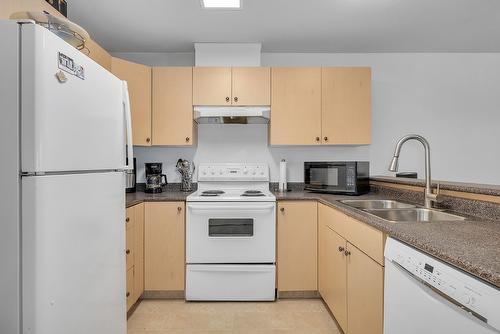 101-2733 Riffington Place, West Kelowna, BC - Indoor Photo Showing Kitchen With Double Sink