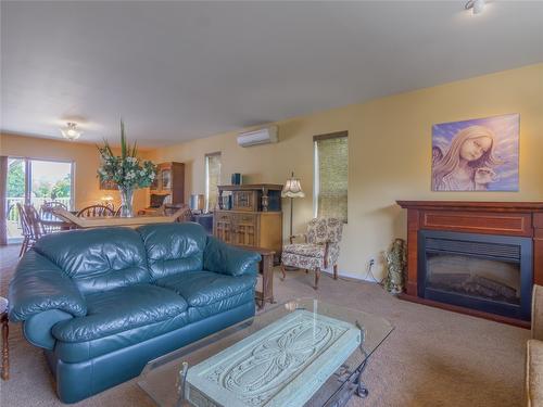 238 Park Rill Road, Oliver, BC - Indoor Photo Showing Living Room With Fireplace