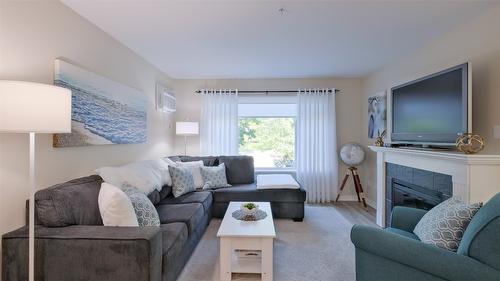 210-686 Lequime Road, Kelowna, BC - Indoor Photo Showing Living Room With Fireplace