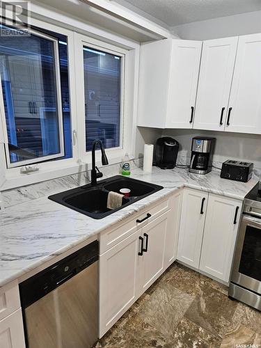 305 2Nd Street, Duck Lake, SK - Indoor Photo Showing Kitchen With Double Sink