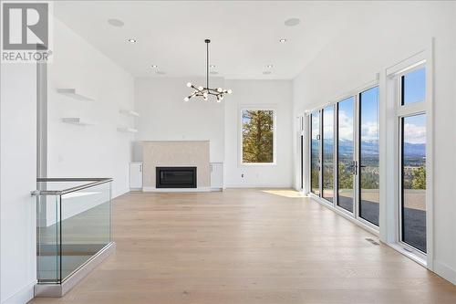 2302 Lavetta Drive, Kelowna, BC - Indoor Photo Showing Living Room With Fireplace