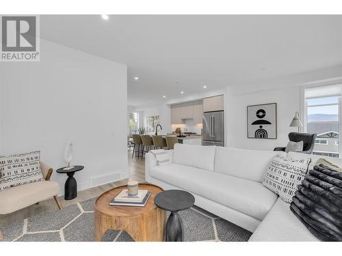 Living Room - Photo of a similar home in the community. - 1455 Cara Glen Court Unit# 116, Kelowna, BC - Indoor Photo Showing Living Room