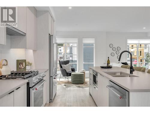 Kitchen - Photo of a similar home in the community. - 1455 Cara Glen Court Unit# 116, Kelowna, BC - Indoor Photo Showing Kitchen With Stainless Steel Kitchen With Double Sink With Upgraded Kitchen