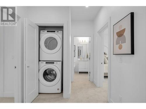 Laundry - Photo of a similar home in the community. - 1455 Cara Glen Court Unit# 116, Kelowna, BC - Indoor Photo Showing Laundry Room