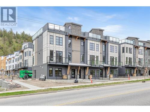 Front Exterior - Photo of a similar home in the community. - 1455 Cara Glen Court Unit# 116, Kelowna, BC - Outdoor With Facade