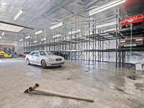 Garage - 709  - 709B Ch. De La Rivière N., Saint-Eustache, QC - Indoor Photo Showing Garage