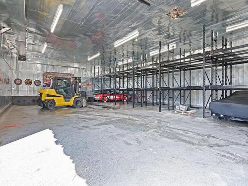 Garage - 709  - 709B Ch. De La Rivière N., Saint-Eustache, QC - Indoor Photo Showing Garage