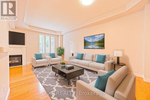 13 - 5151 Upper Middle Road, Burlington (Orchard), ON - Indoor Photo Showing Living Room With Fireplace