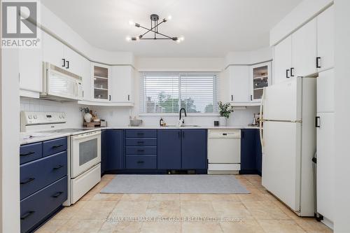 9 - 4 Paradise Boulevard, Ramara (Brechin), ON - Indoor Photo Showing Kitchen