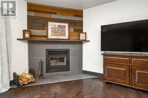 347 Dry Pine Bay, Alban, ON - Indoor Photo Showing Living Room With Fireplace