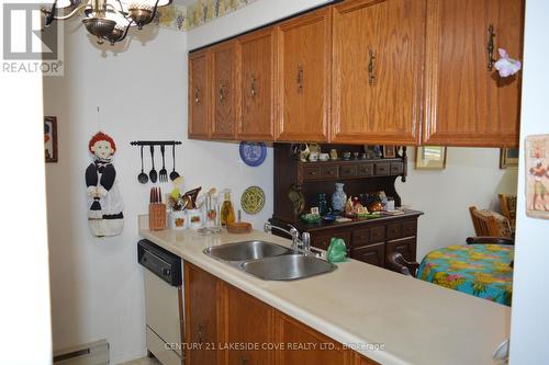 8 - 21 Laguna Parkway, Ramara (Brechin), ON - Indoor Photo Showing Kitchen With Double Sink