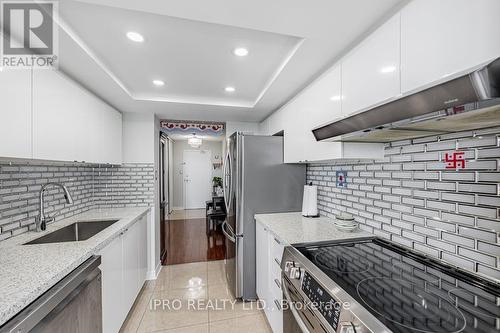 2204 - 3 Rowntree Road, Toronto (Mount Olive-Silverstone-Jamestown), ON - Indoor Photo Showing Kitchen With Upgraded Kitchen