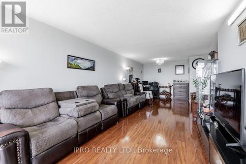 2204 - 3 Rowntree Road, Toronto (Mount Olive-Silverstone-Jamestown), ON - Indoor Photo Showing Living Room