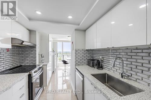 2204 - 3 Rowntree Road, Toronto (Mount Olive-Silverstone-Jamestown), ON - Indoor Photo Showing Kitchen With Upgraded Kitchen