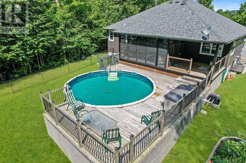 25 Powerline Road, Brighton, ON - Outdoor With Above Ground Pool With Deck Patio Veranda