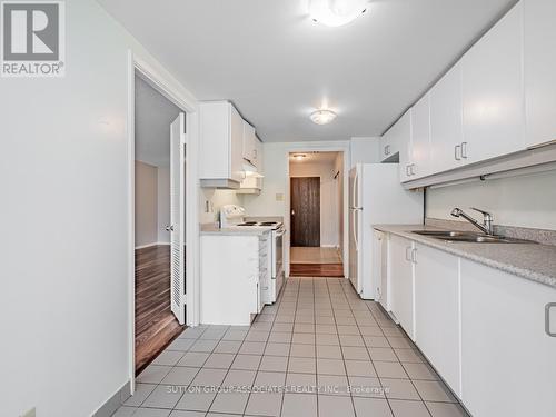 604 - 44 Gerrard Street W, Toronto (Bay Street Corridor), ON - Indoor Photo Showing Kitchen With Double Sink