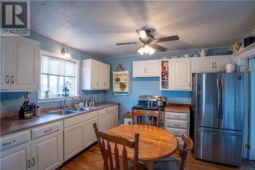 32 Copp, Dieppe, NB - Indoor Photo Showing Kitchen With Double Sink