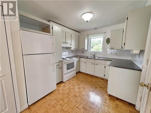 25 Du Ruisseau, Lamèque, NB - Indoor Photo Showing Kitchen With Double Sink