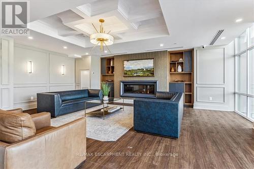 906 - 470 Dundas Street E, Hamilton, ON - Indoor Photo Showing Living Room With Fireplace