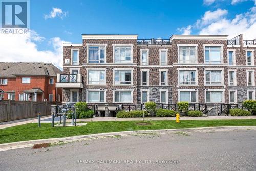 105 - 2 Dunsheath Way, Markham (Cornell), ON - Outdoor With Facade