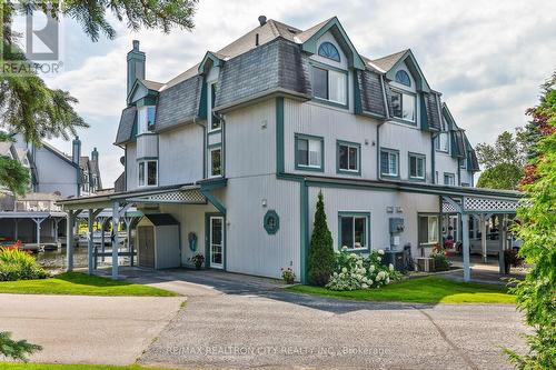 7 - 24 Laguna Parkway, Ramara (Brechin), ON - Outdoor With Deck Patio Veranda With Facade