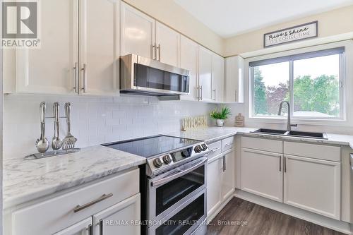 7 - 24 Laguna Parkway, Ramara (Brechin), ON - Indoor Photo Showing Kitchen With Upgraded Kitchen