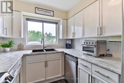 7 - 24 Laguna Parkway, Ramara (Brechin), ON - Indoor Photo Showing Kitchen With Double Sink With Upgraded Kitchen