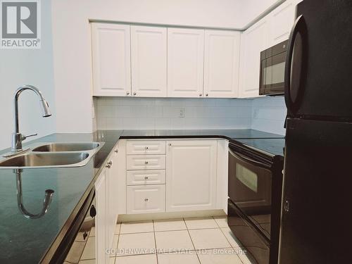 Gv128 - 17 Barberry Place, Toronto, ON - Indoor Photo Showing Kitchen With Double Sink