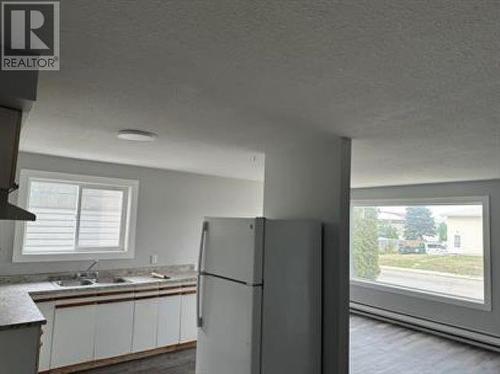 9619 102 Street, Fort St. John, BC - Indoor Photo Showing Kitchen With Double Sink