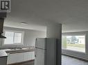 9619 102 Street, Fort St. John, BC  - Indoor Photo Showing Kitchen With Double Sink 