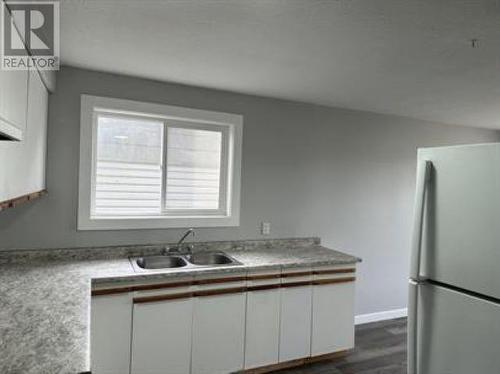 9619 102 Street, Fort St. John, BC - Indoor Photo Showing Kitchen With Double Sink