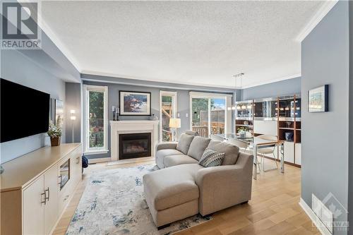 39 Kimberwick Crescent, Ottawa, ON - Indoor Photo Showing Living Room With Fireplace