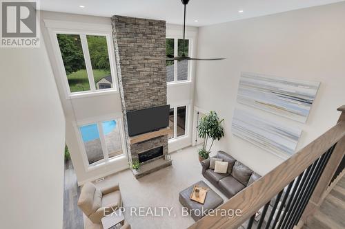 8037 Springwater Road, Aylmer, ON - Indoor With Fireplace