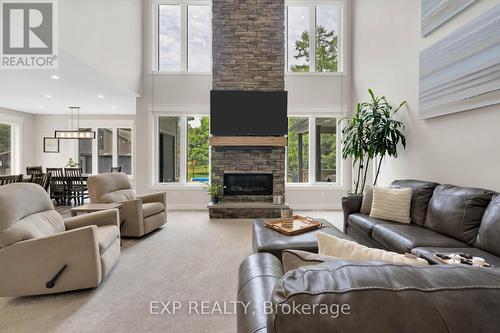 8037 Springwater Road, Aylmer, ON - Indoor Photo Showing Living Room With Fireplace