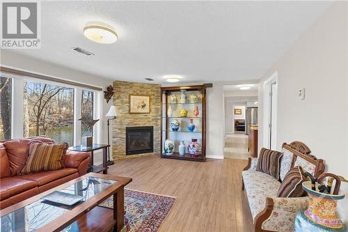 4229 Rideau Valley Drive, Ottawa, ON - Indoor Photo Showing Living Room With Fireplace