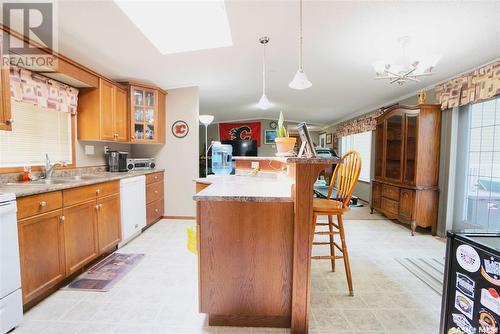 402 4Th Avenue, Avonlea, SK - Indoor Photo Showing Kitchen With Double Sink