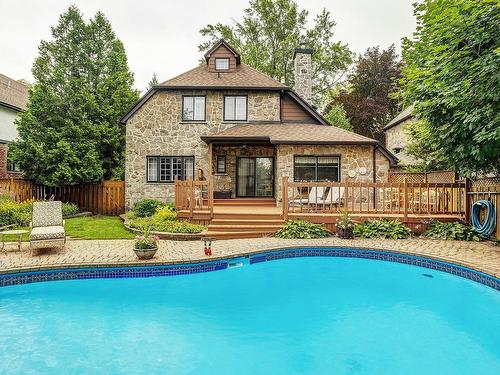 Back facade - 5587 Ch. Queen-Mary, Hampstead, QC - Outdoor With In Ground Pool With Deck Patio Veranda