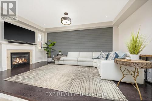 599 Nairn Circle, Milton, ON - Indoor Photo Showing Living Room With Fireplace