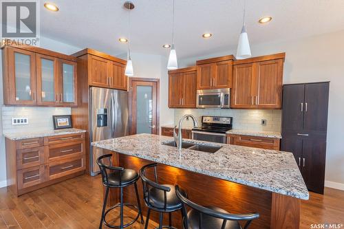 5117 Aerial Crescent, Regina, SK - Indoor Photo Showing Kitchen With Stainless Steel Kitchen With Double Sink With Upgraded Kitchen