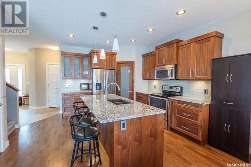 5117 Aerial Crescent, Regina, SK - Indoor Photo Showing Kitchen With Stainless Steel Kitchen With Double Sink With Upgraded Kitchen