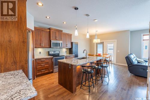 5117 Aerial Crescent, Regina, SK - Indoor Photo Showing Kitchen With Stainless Steel Kitchen With Double Sink With Upgraded Kitchen