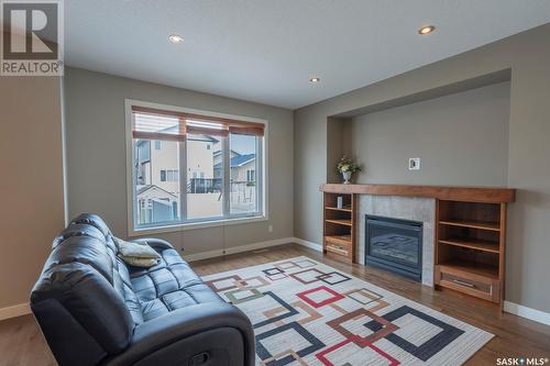 5117 Aerial Crescent, Regina, SK - Indoor Photo Showing Living Room With Fireplace