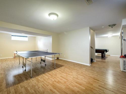 Salle familiale - 8 Rue Vincent-Blouin, Kirkland, QC - Indoor Photo Showing Other Room