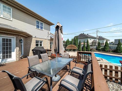 Piscine - 8 Rue Vincent-Blouin, Kirkland, QC - Outdoor With Deck Patio Veranda With Exterior