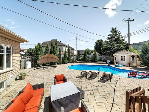 Piscine - 8 Rue Vincent-Blouin, Kirkland, QC - Outdoor With In Ground Pool With Exterior