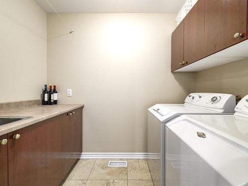 Salle de lavage - 8 Rue Vincent-Blouin, Kirkland, QC - Indoor Photo Showing Laundry Room