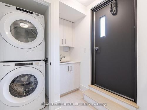 Ph-407-14 Dewhurst Blvd, Toronto, ON - Indoor Photo Showing Laundry Room