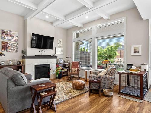 100-641 Shuswap Road E, Kamloops, BC - Indoor Photo Showing Living Room With Fireplace