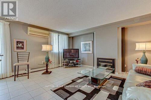 309 - 1255 Commissioners Road W, London, ON - Indoor Photo Showing Living Room With Fireplace